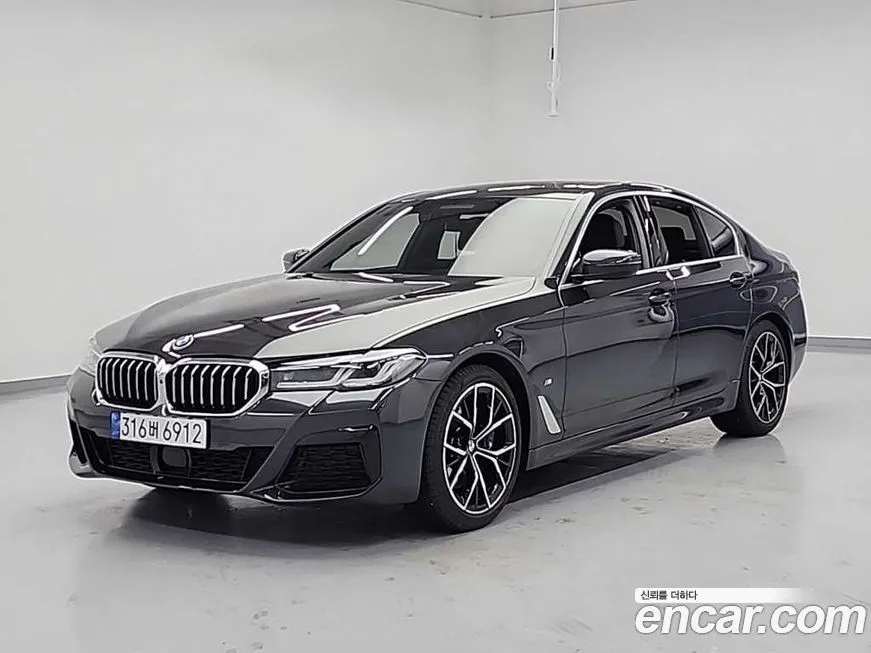 BMW 5-Series — фото 1