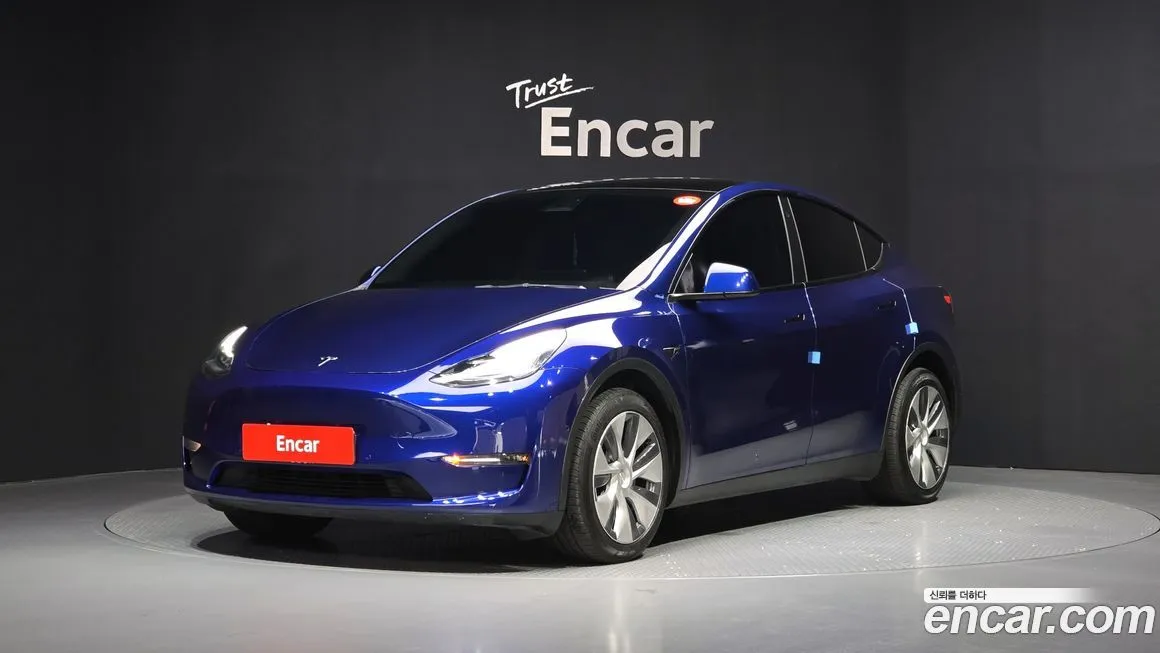 Tesla Model Y — фото 1