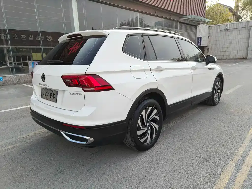 Volkswagen Tiguan L — фото 7