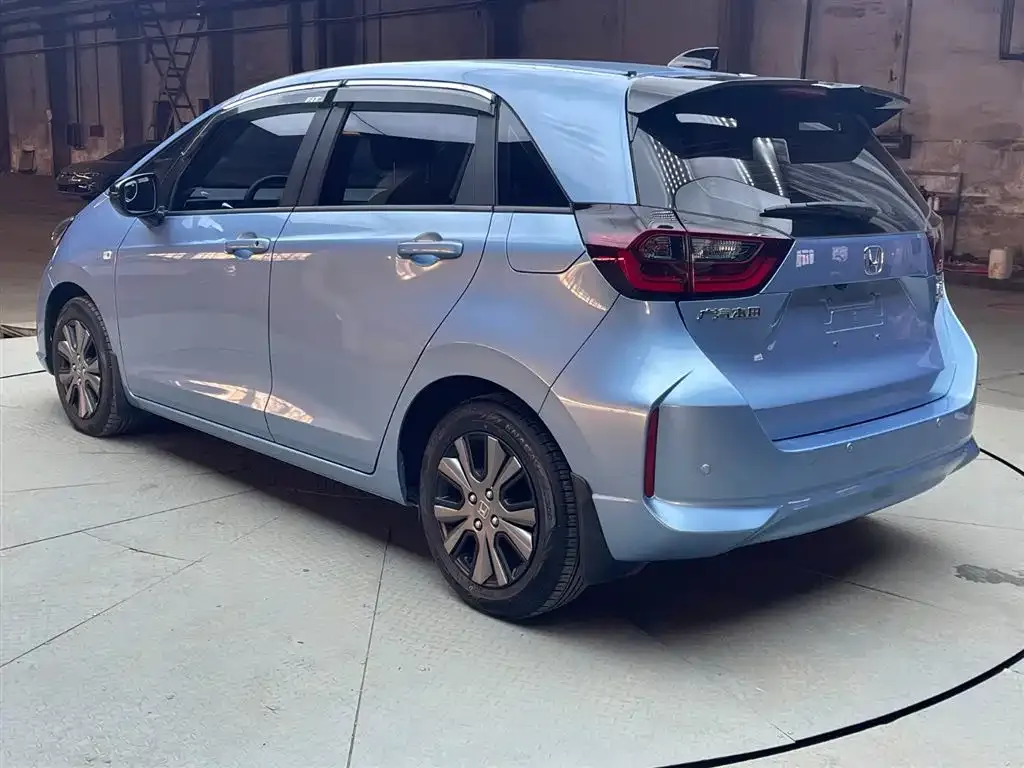 Honda Fit — фото 7