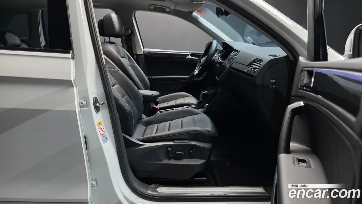 Volkswagen Tiguan — фото 10