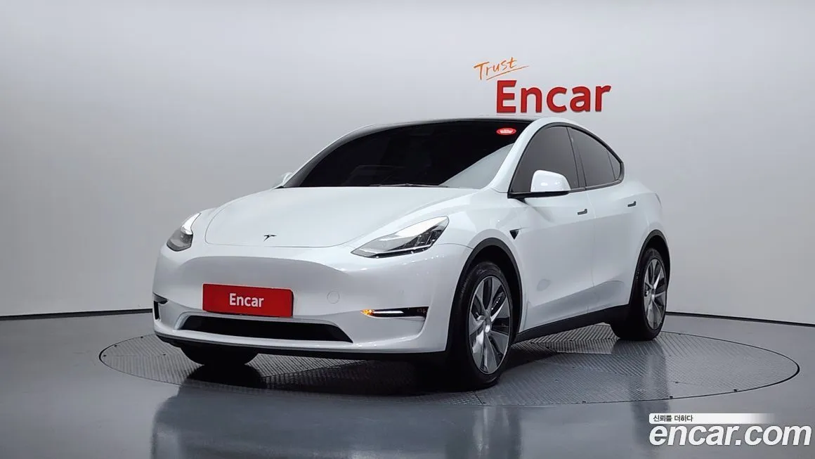 Tesla Model Y — фото 1