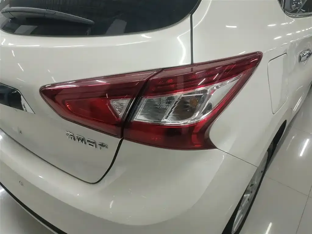 Nissan Tiida — фото 8