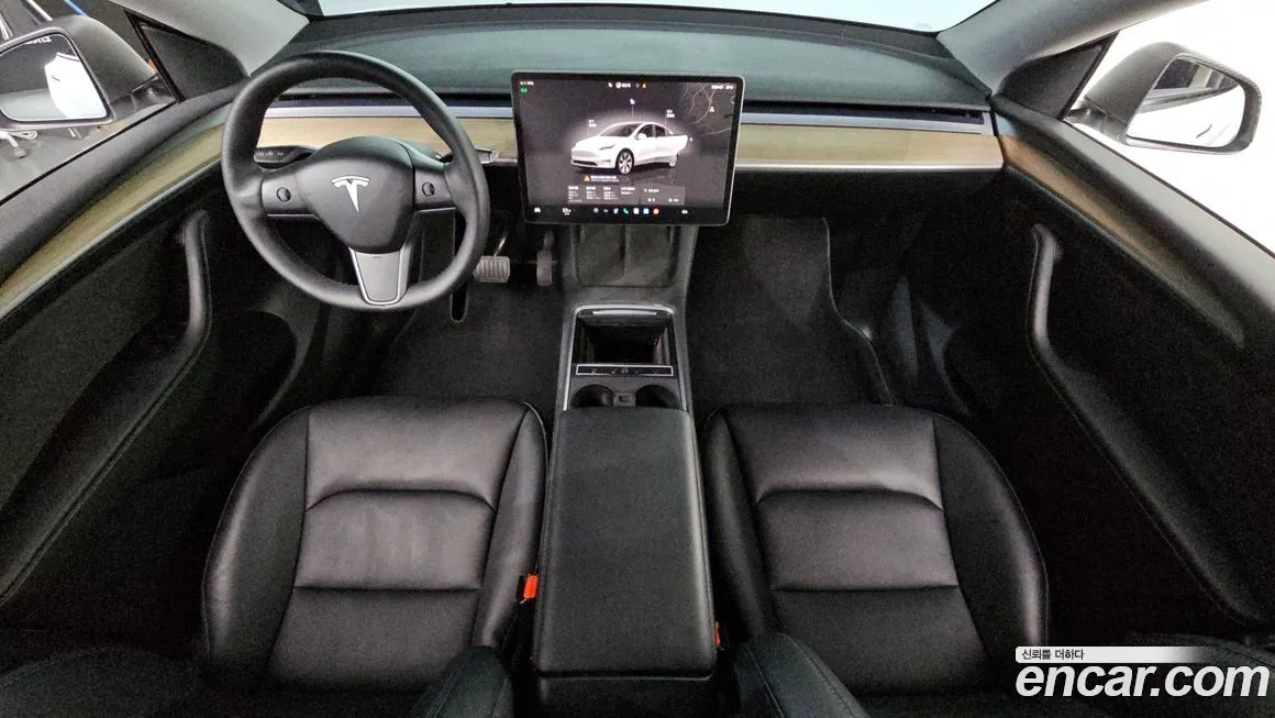 Tesla Model Y — фото 7