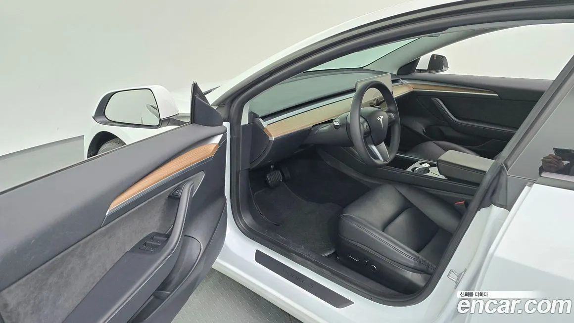 Tesla Model 3 — фото 10