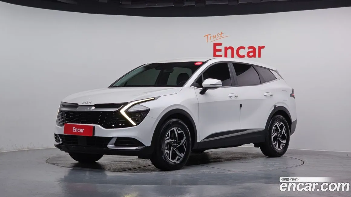 Kia Sportage — фото 1