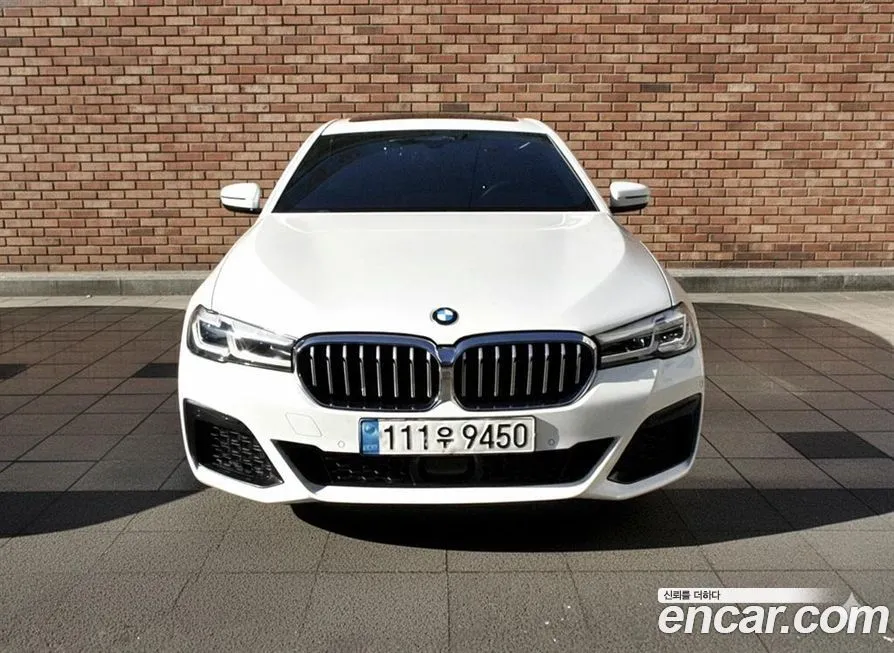 BMW 5-Series — фото 1