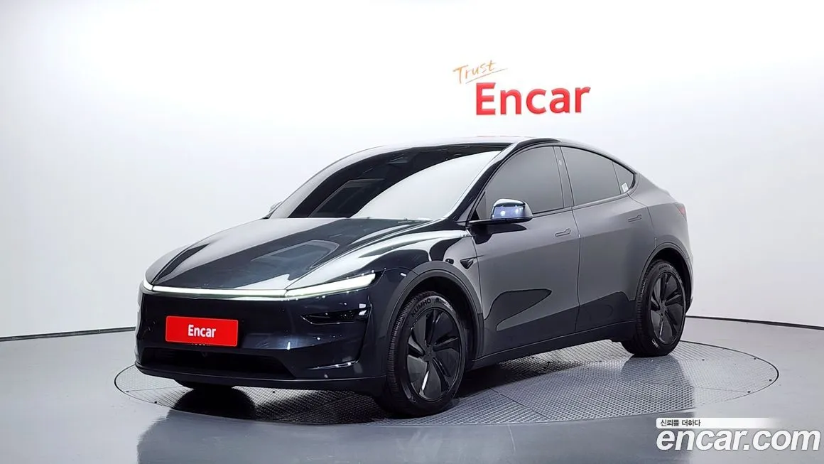 Tesla Model Y — фото 1