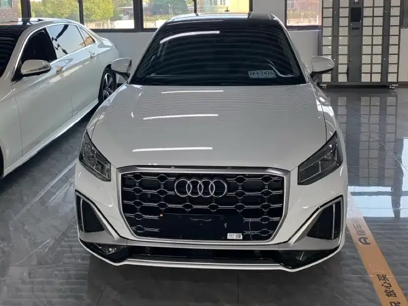 Audi Q2L — фото 2