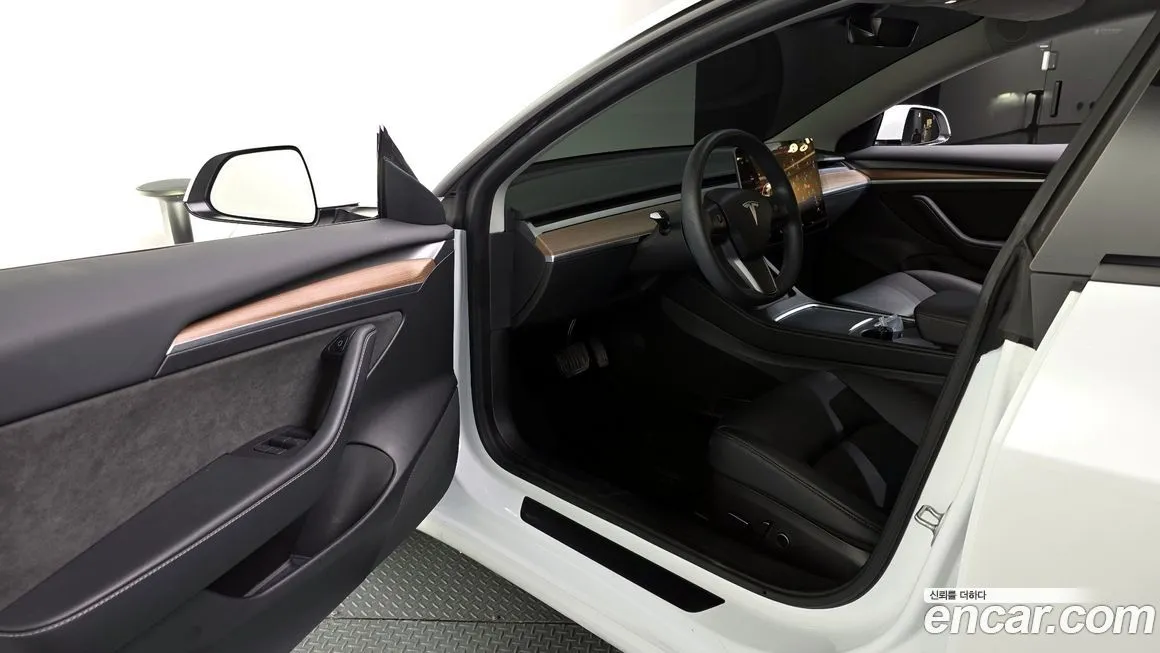 Tesla Model 3 — фото 10