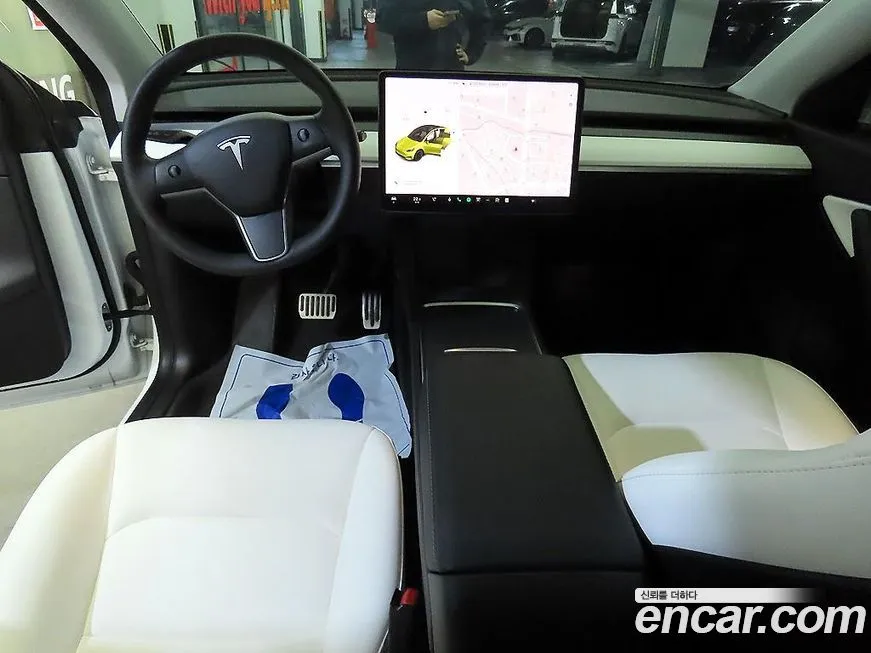 Tesla Model Y — фото 10