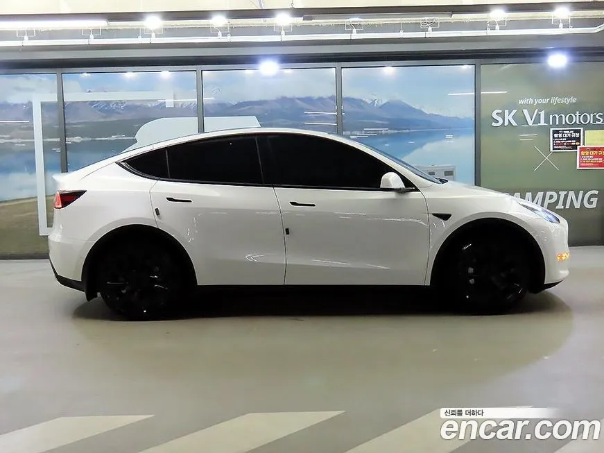 Tesla Model Y — фото 3