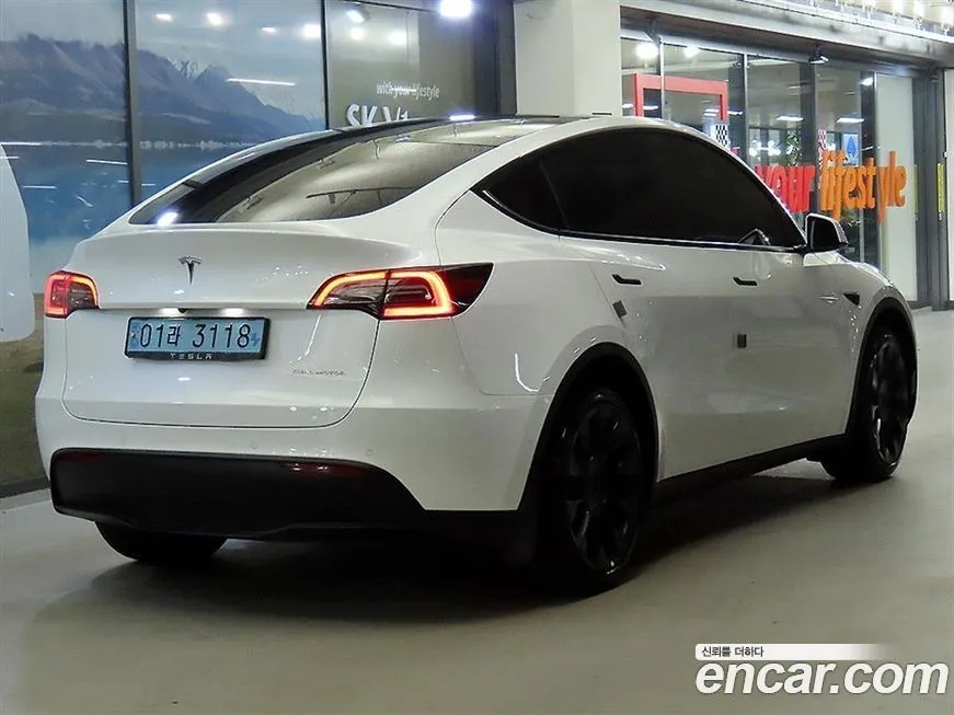 Tesla Model Y — фото 4