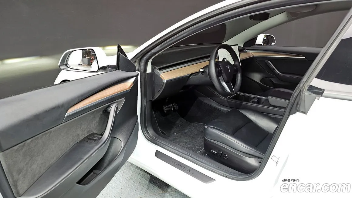 Tesla Model 3 — фото 10