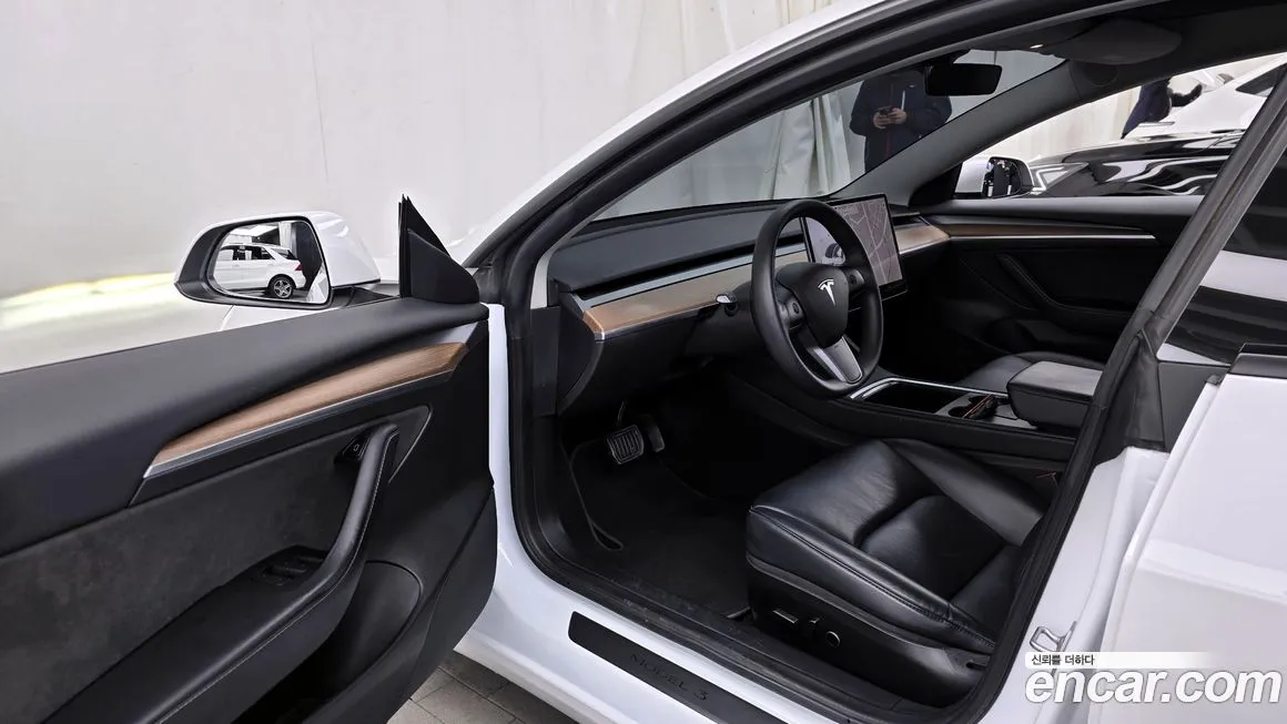 Tesla Model 3 — фото 10
