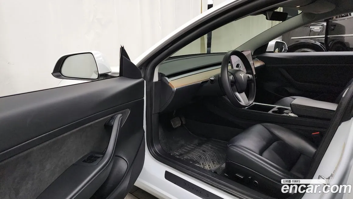 Tesla Model 3 — фото 10