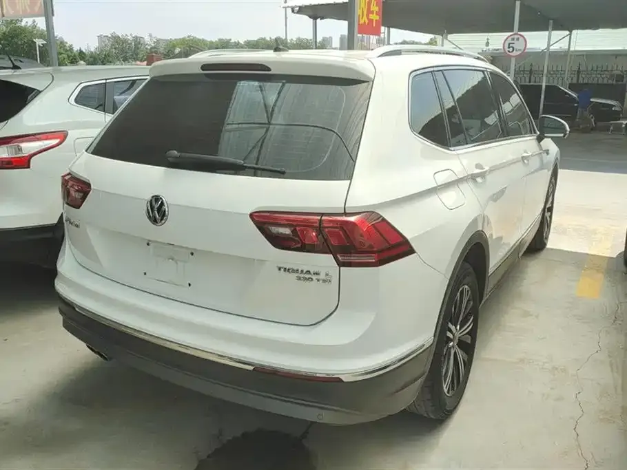 Volkswagen Tiguan L — фото 3
