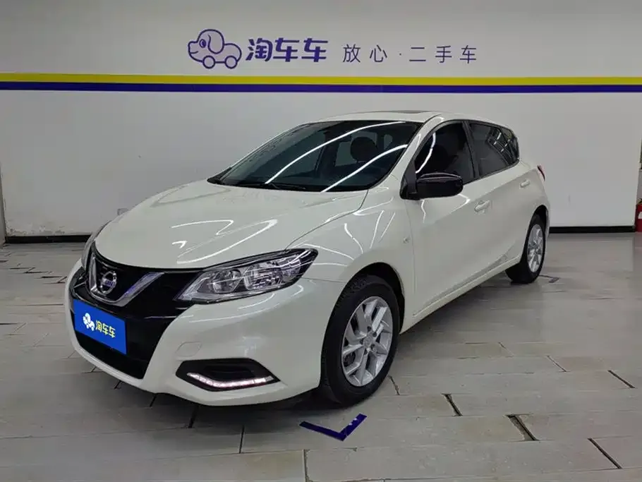 Nissan Tiida — фото 1