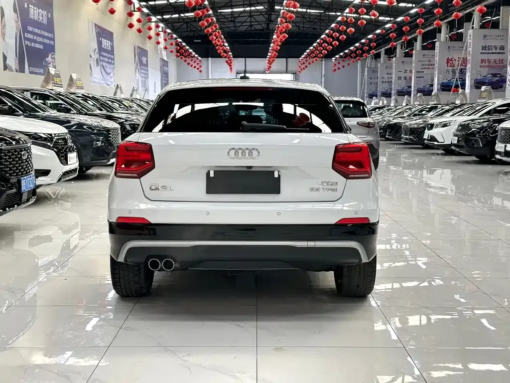 Audi Q2L — фото 5