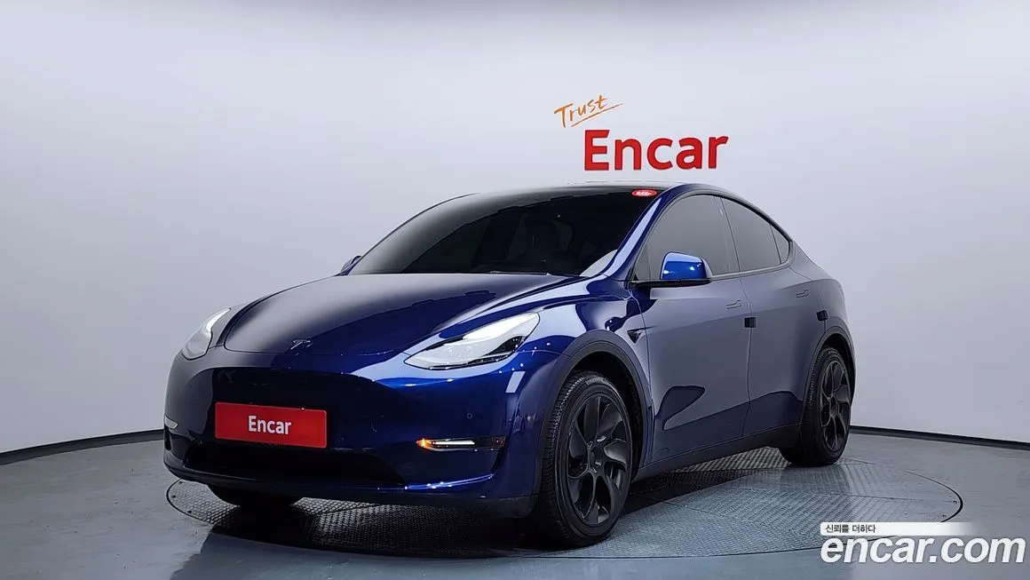 Tesla Model Y — фото 1