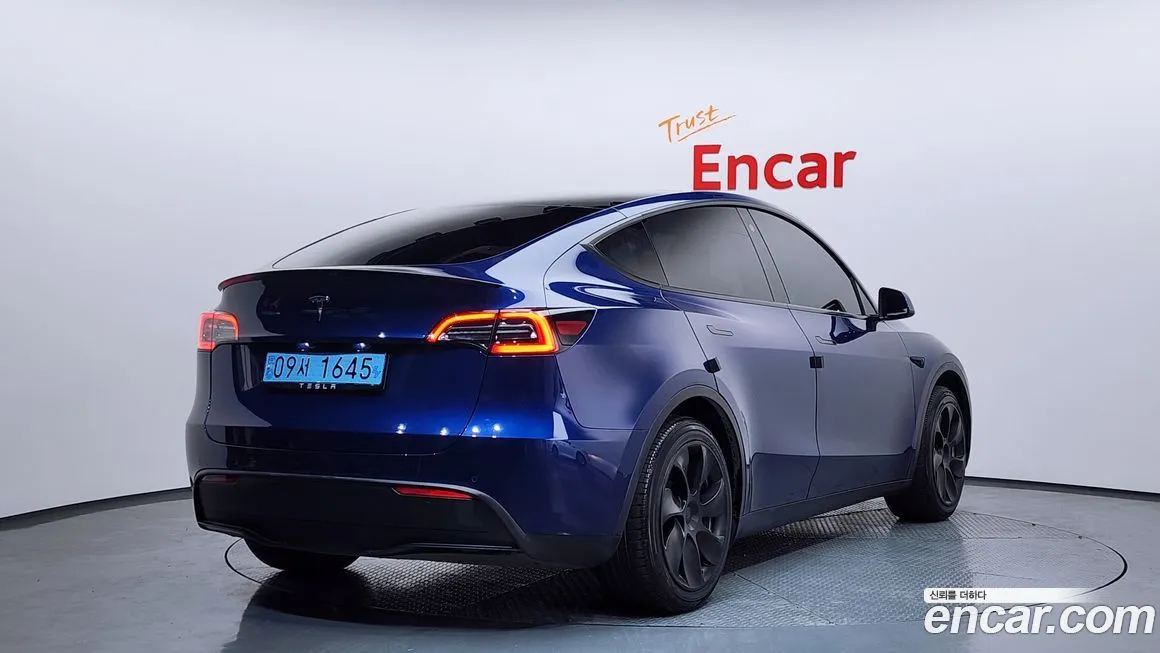 Tesla Model Y — фото 2