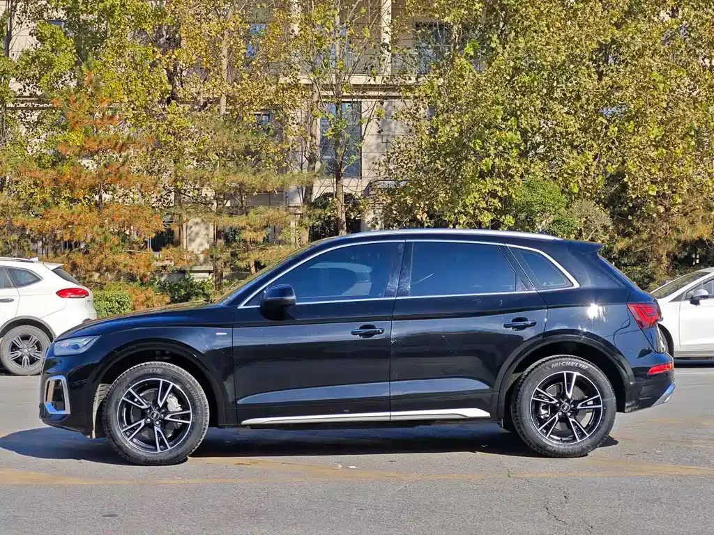 Audi Q5L — фото 7