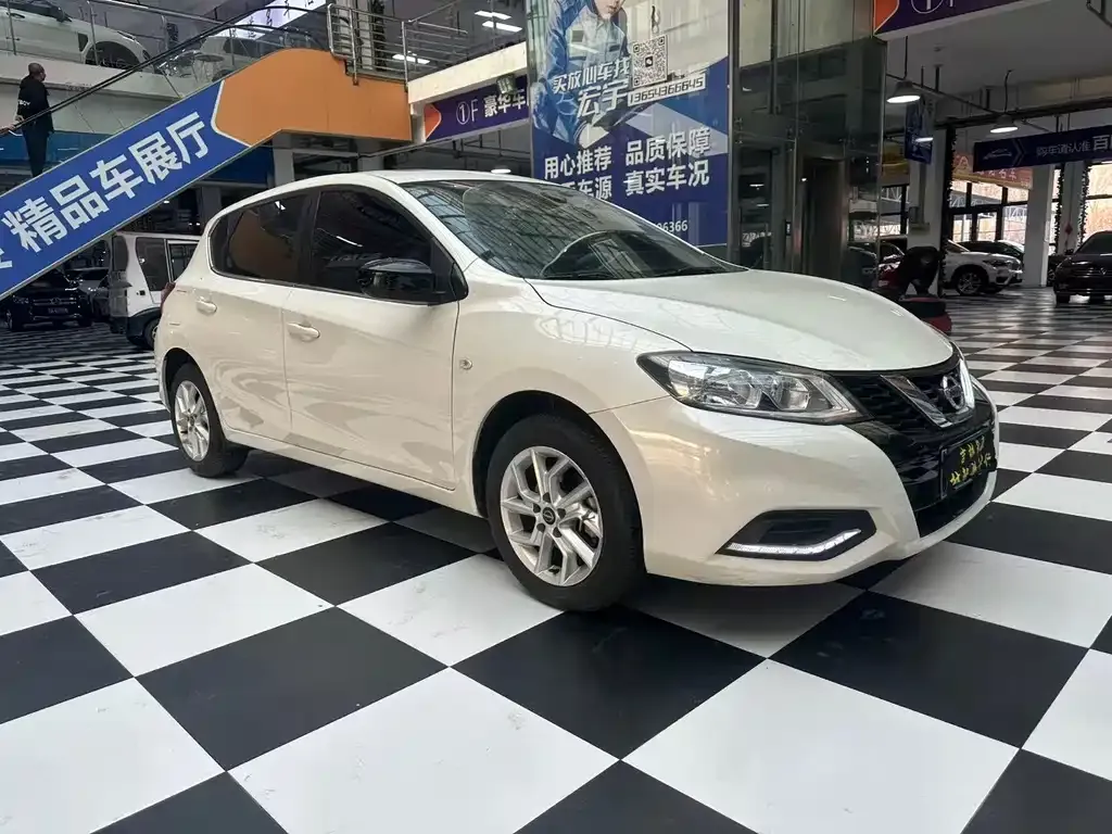 Nissan Tiida — фото 3