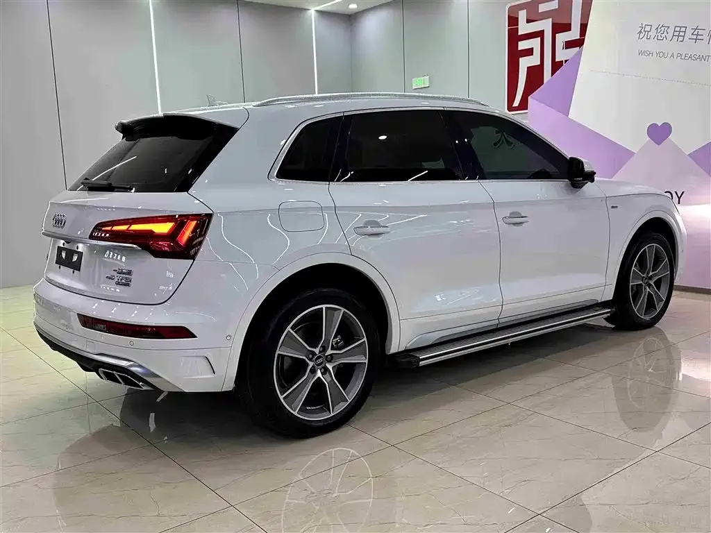Audi Q5L — фото 6