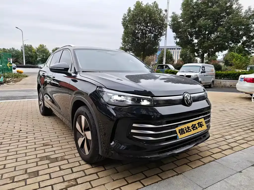 Volkswagen Tiguan L — фото 2