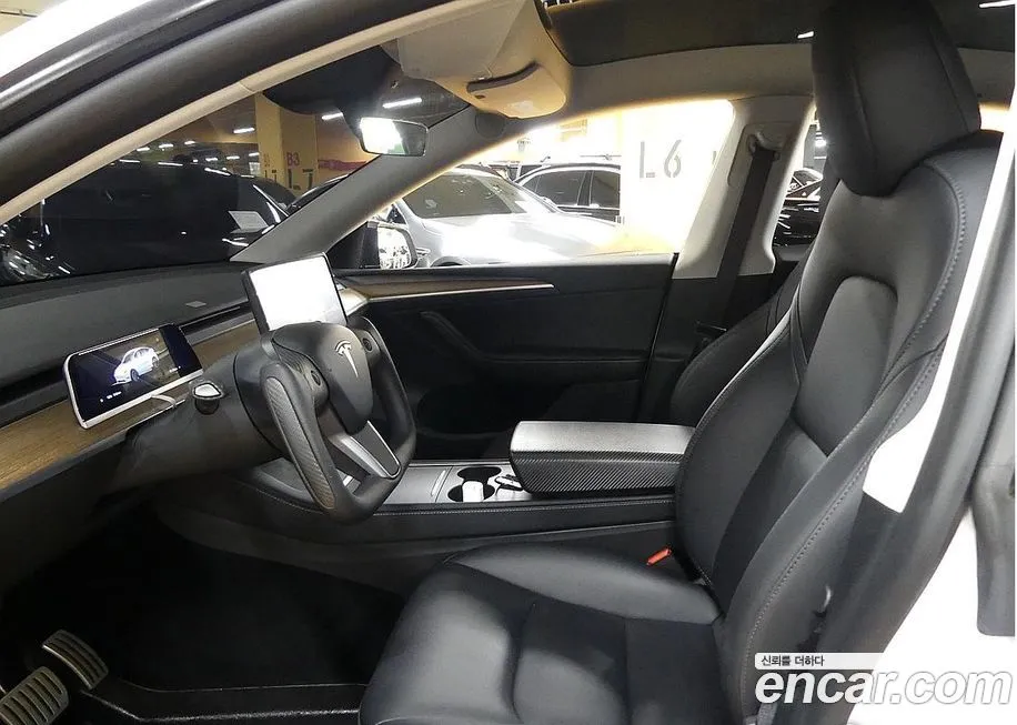 Tesla Model Y — фото 10