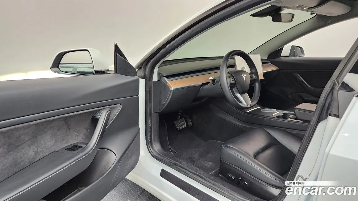 Tesla Model 3 — фото 10