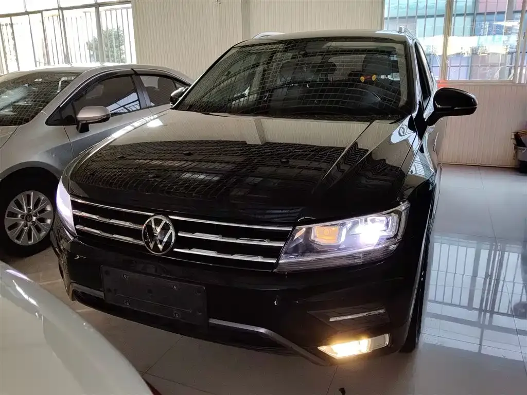 Volkswagen Tiguan L — фото 3