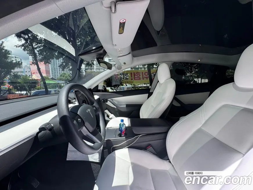 Tesla Model Y — фото 10