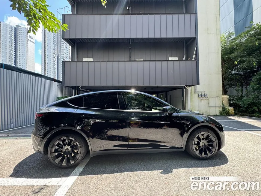 Tesla Model Y — фото 5