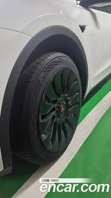 Tesla Model Y — фото 6