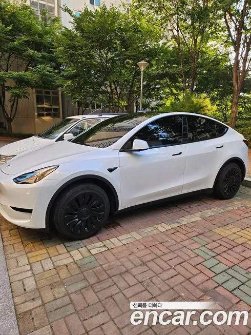 Tesla Model Y — фото 7