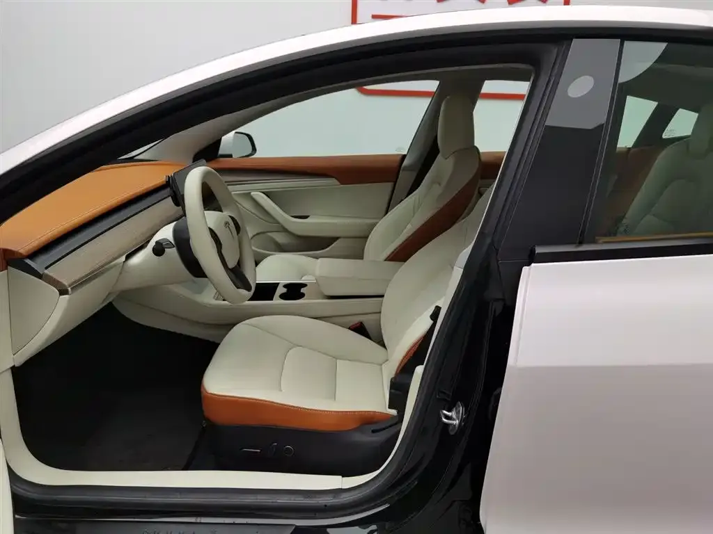 Tesla Model 3 — фото 10
