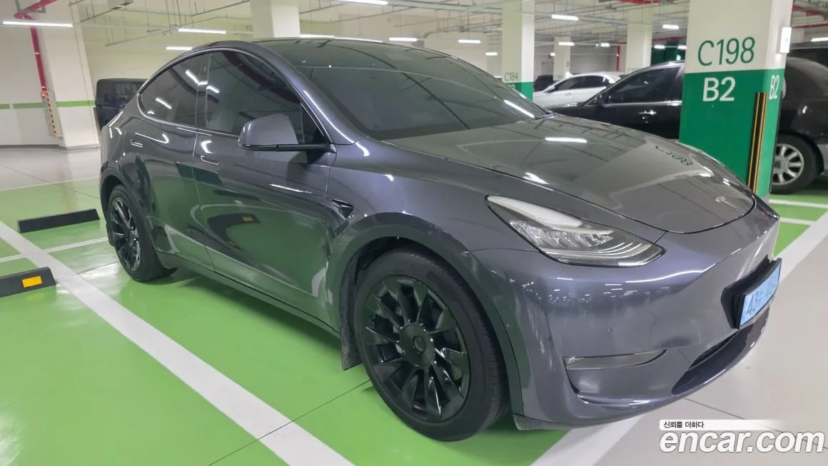 Tesla Model Y — фото 7