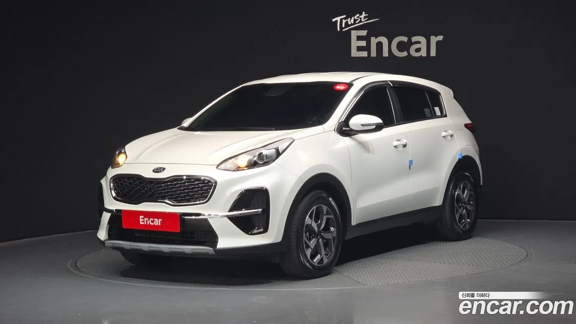 Kia Sportage — фото 1