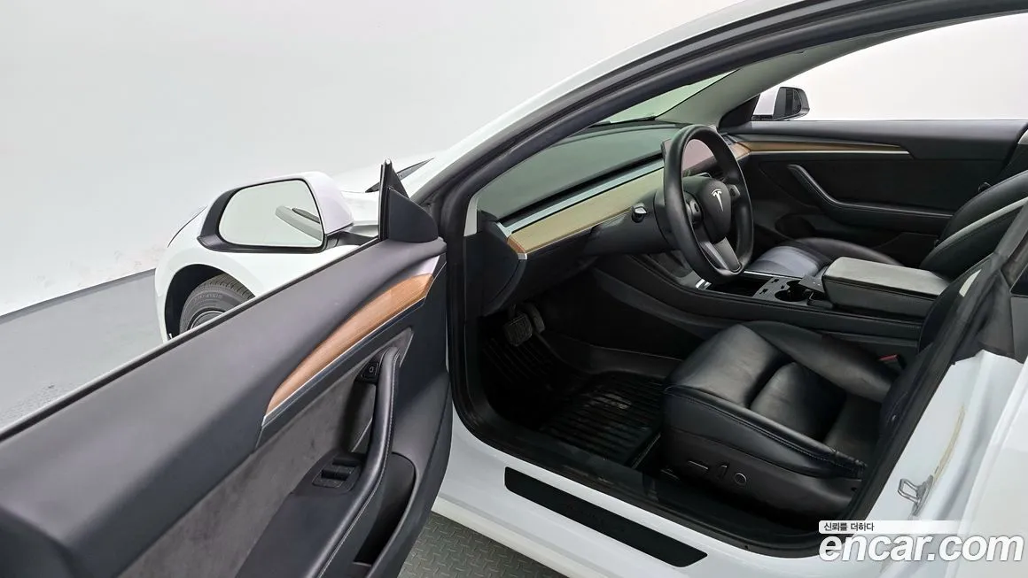 Tesla Model 3 — фото 10