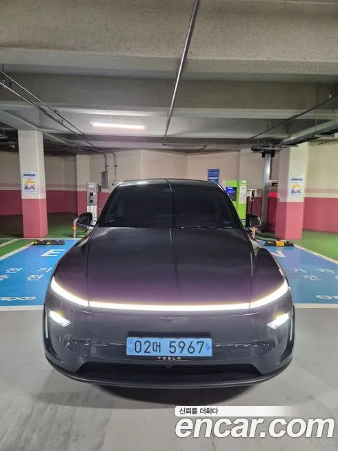 Tesla Model Y — фото 1