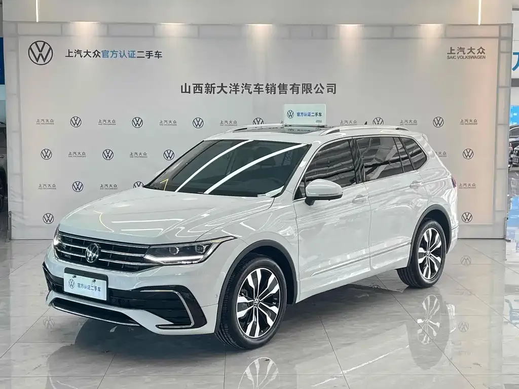 Volkswagen Tiguan L — фото 1
