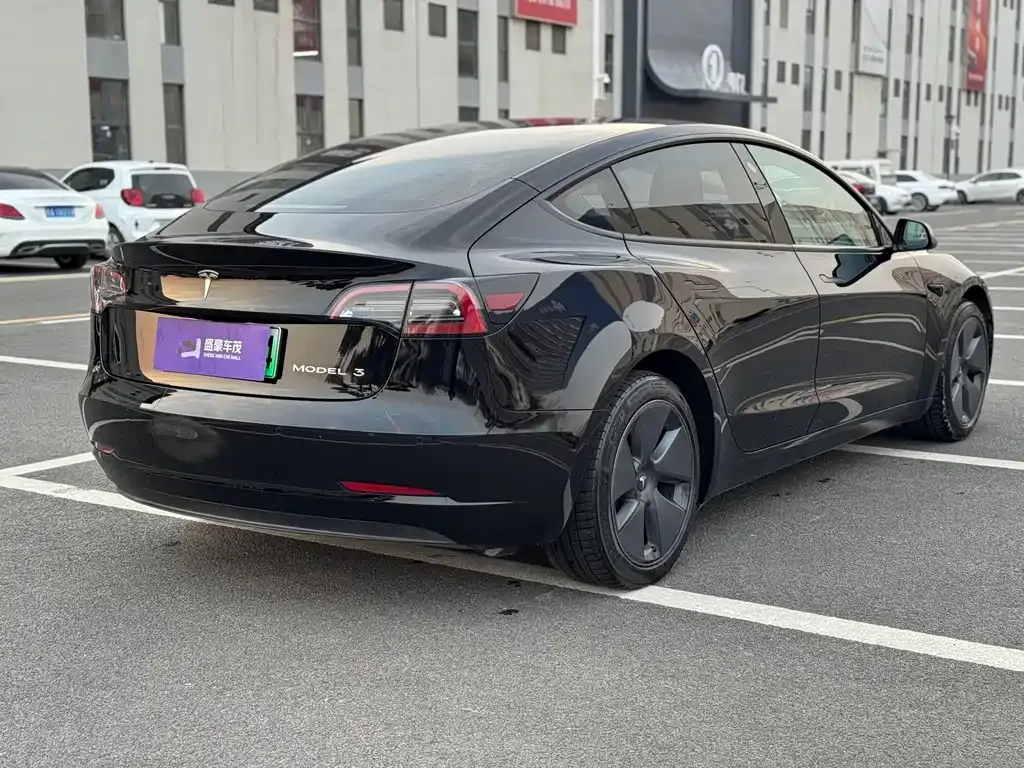 Tesla Model 3 — фото 7