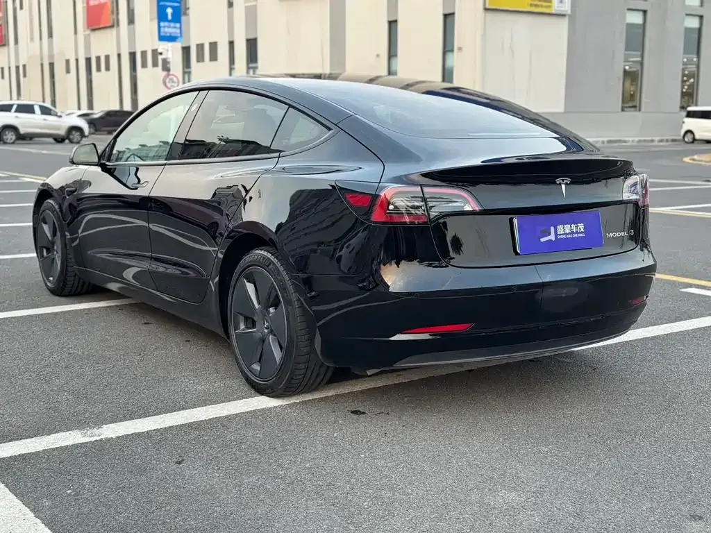 Tesla Model 3 — фото 9