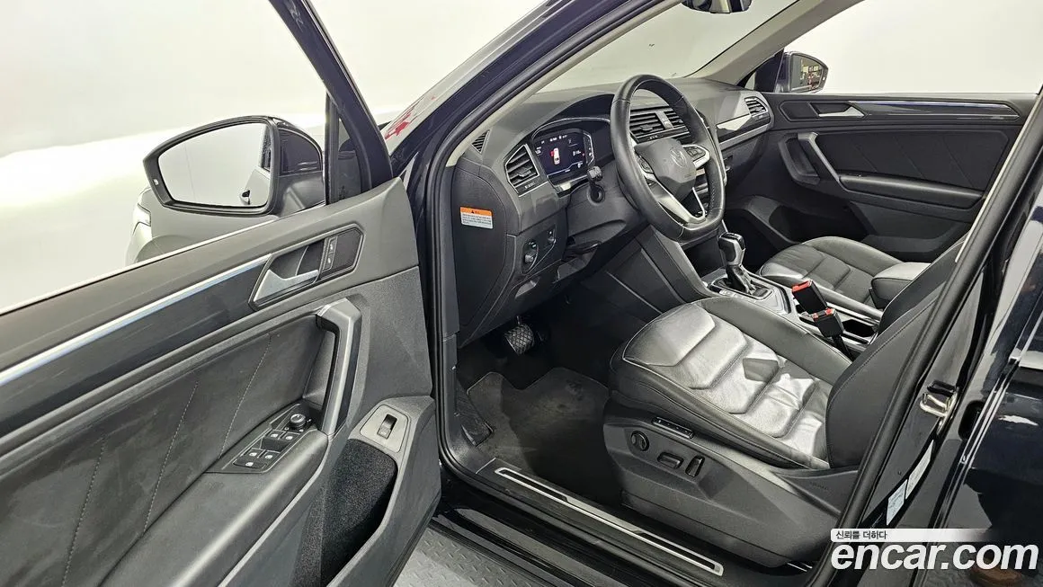 Volkswagen Tiguan — фото 10