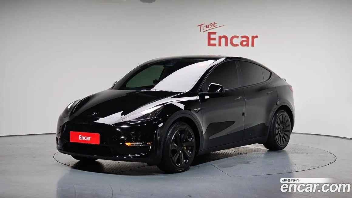 Tesla Model Y — фото 1
