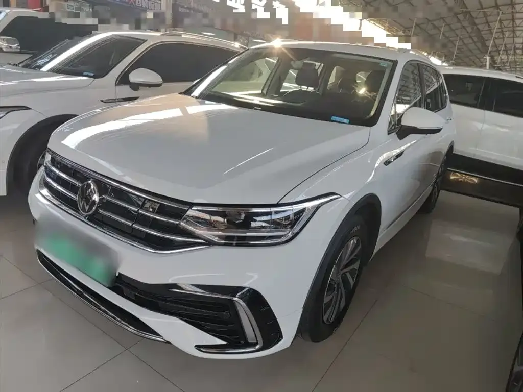 Volkswagen Tiguan L New Energy — фото 1