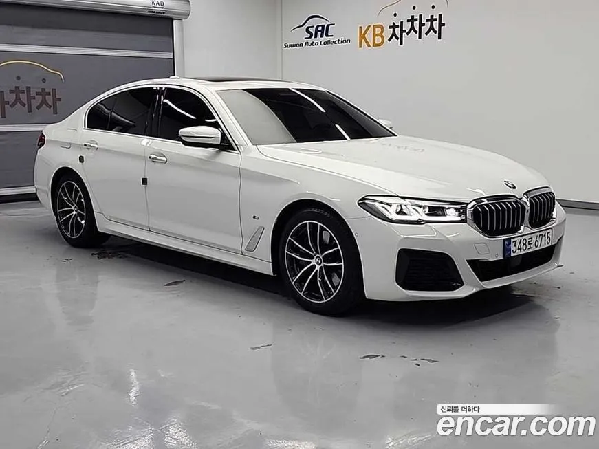 BMW 5-Series — фото 1