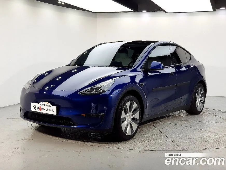 Tesla Model Y — фото 1