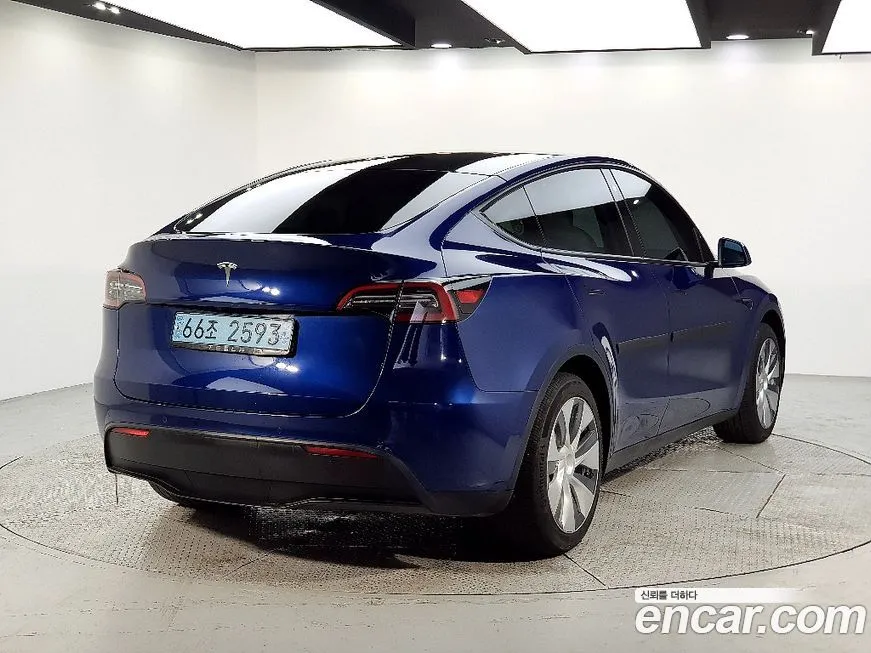 Tesla Model Y — фото 4